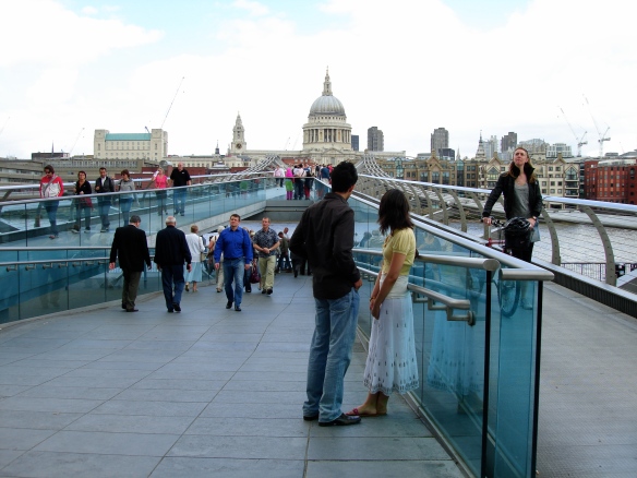 My husband and I looking at St. Paul's Cathedral from London's Millenium Bridge.